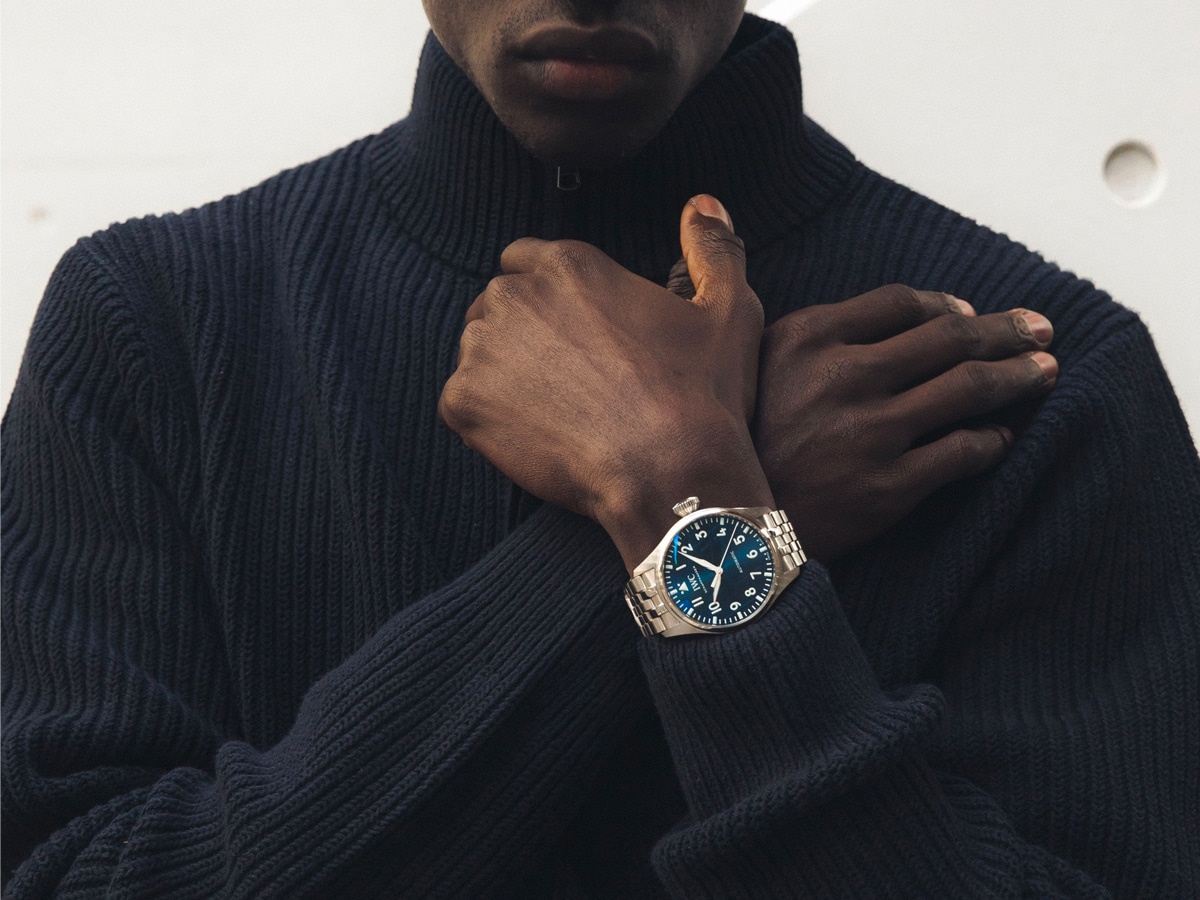 Close up of a man's wrist with an IWC watch